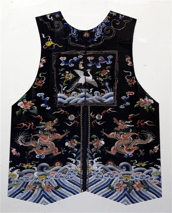 A Chinese black satin embroidered silk court jacket, Qing dynasty, 104 x 82cm